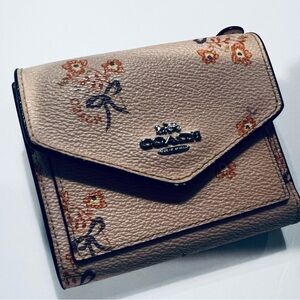 Coach Pink and Orange Wallet with Elegant floral accents
